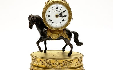 A French bronzed brass horse mantle clock H. 39cm.