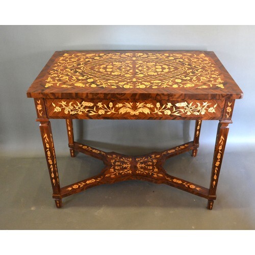 A French style marquetry inlaid rectangular centre table, th...