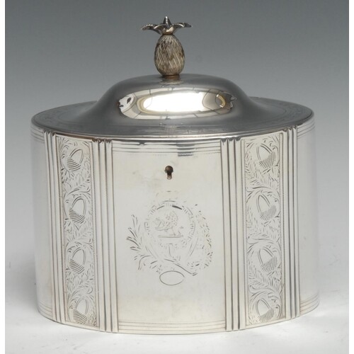 A George III Provincial silver oval tea caddy, hinged domed ...