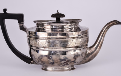 A George III Silver Oval Teapot, by Solomon Hougham, London...