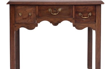 A George III mahogany lowboy side table, circa 1765; the top...