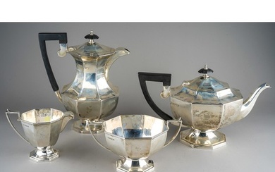 A George VI silver four piece tea service comprising teapot,...