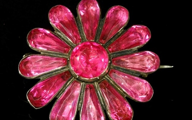 A Georgian silver, pink foil-backed paste flower head brooch