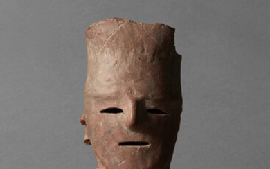 A HANIWA EATHENWARE HEAD LATE KOFUN PERIOD (6TH-7TH CENTURY)