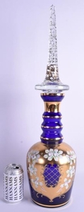 A LARGE BOHEMIAN GILT OVERLAID DECANTER AND STOPPER