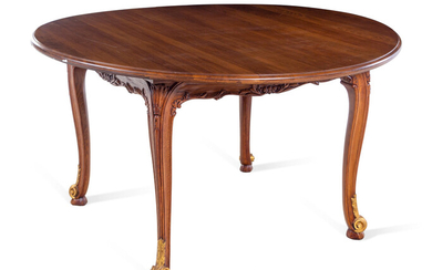 A Louis XV Style Parcel Gilt Walnut Center Table