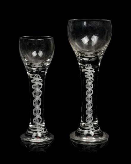 A Near Pair of English Glass Presentation Goblets