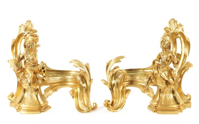 A PAIR OF 19TH CENTURY GILT ORMOLU CHENETS OF...
