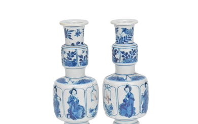 A PAIR OF BLUE AND WHITE AND COPPER-RED MOULDED VASES...