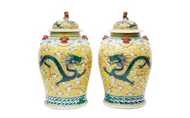 A PAIR OF CHINESE FAMILLE-ROSE YELLOW-GROUND VASES FOR THE STRAITS OR PERANAKAN MARKET 清十九世紀 粉彩黃地雲龍趕珠紋瓶一對