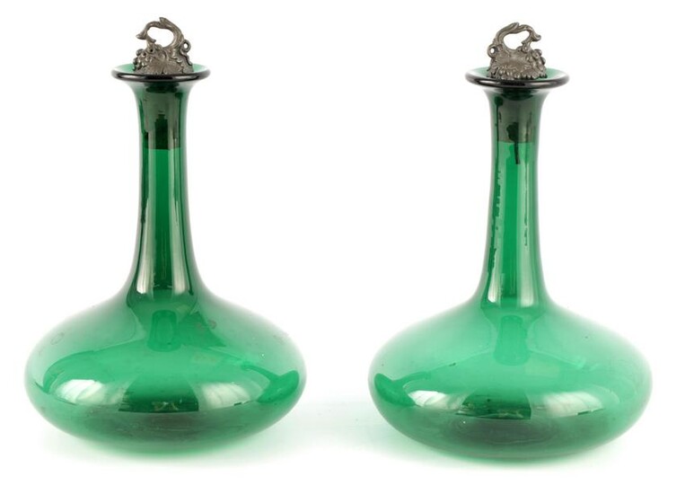 A PAIR OF LATE GEORGIAN BRISTOL GREEN DECANTERS wi