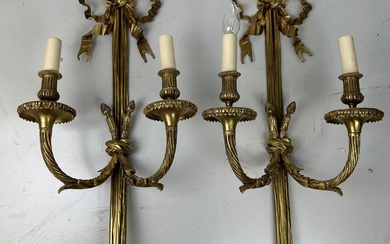 A PAIR OF REGENCY STYLE GILT BRASS WALL SCONCES...