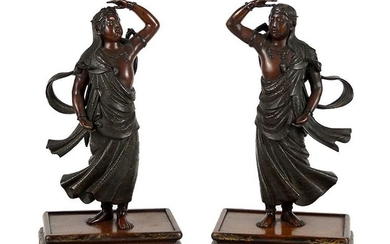 A Pair of Asian Patinated Bronze Figures.