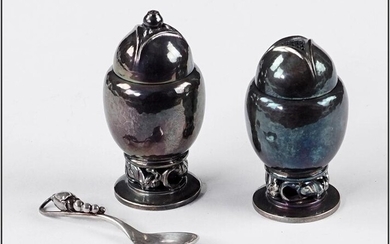 A Pair of Georg Jensen Sterling Silver Shakers.