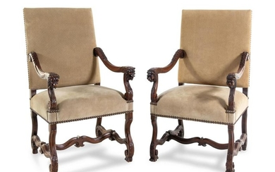 A Pair of Louis XIV Style Carved Walnut Armchairs