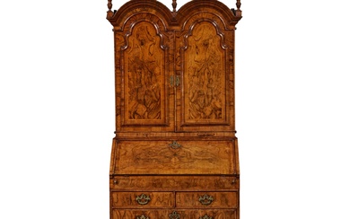 A Queen Anne Double Domed Walnut Bureau Cabinet, Circa 1710