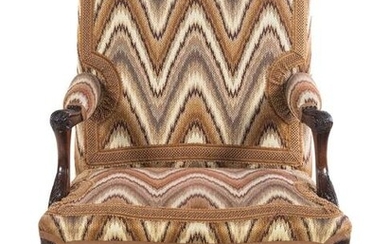 A Regence Style Carved Walnut Fauteuil