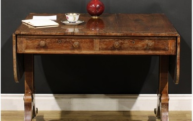 A Regency rosewood sofa table, crossbanded rounded rectangul...