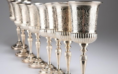 A SET OF EIGHT SILVER-PLATED GOBLETS, each campana bowl
