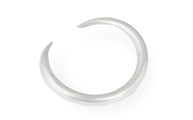 A SILVER 'MOMBASA' NECKLACE, BY HERMÈS The torque style collar...