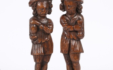 A SMALL PAIR OF 17TH CENTURY OAK FIGURAL TERMS, FLEMISH. Eac...