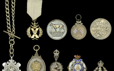 A Selection of Medals and Watch Fobs. A miscellaneous selection including a...