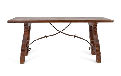A Spanish Colonial Style Trestle Table With Wrought