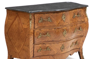 A Swedish Rococo elmwood commode with gilt-bronze handles and mountings. Ca. 1760....