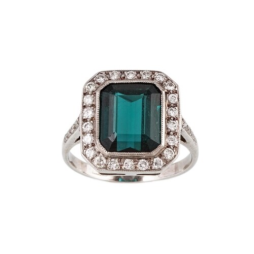 A TOURMALINE AND DIAMOND CLUSTER RING, the blue / green step...