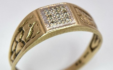A VINTAGE GENTS 9K YELLOW GOLD DIAMOND BAND RING...