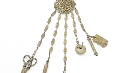 A Victorian silver plate chatelaine with central heraldic ar...