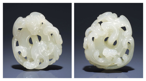 A WHITE JADE RETICULATED 'DOUBLE CHILONG' PENDANT, 17TH-18TH CENTURY
