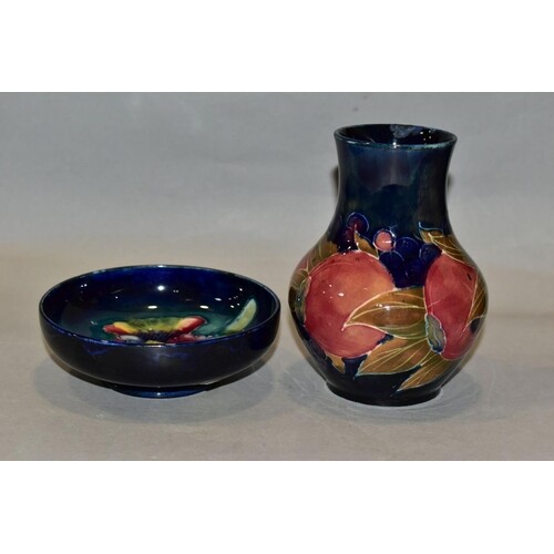 A WILLIAM MOORCROFT SMALL BALUSTER VASE, decorated in the be...