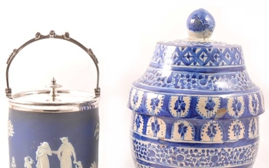 A Wedgwood blue jasperware biscuit box, and a Continental storage jar