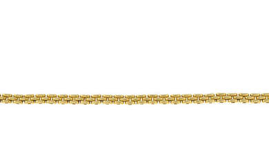 A brick-link bracelet, by Cartier.