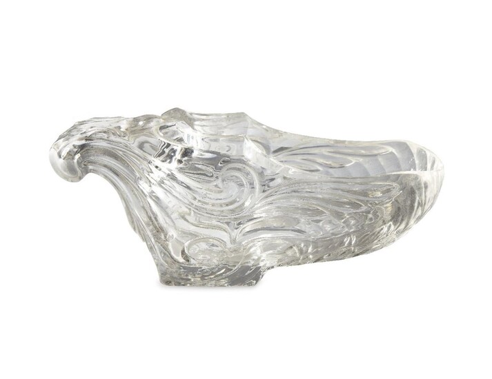 A carved rock crystal cup, second half 20th century, of oval form with a scrolling wave design, 13cm wide