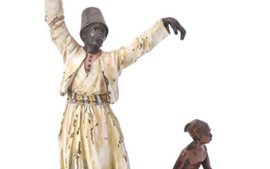 A cold painted bronze figure of a dancing Arab