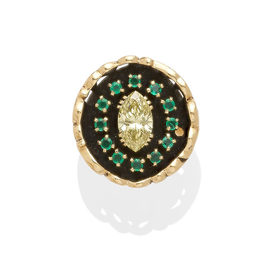 A colored diamond and emerald ring