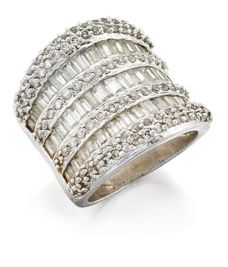 A diamond and baguette diamond broad half-hoop ring, composed of three rows of baguette diamonds and four rows of pave diamonds, to a tapering hoop, ring size N