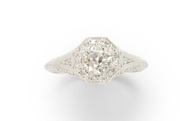 A diamond and fourteen karat white gold ring