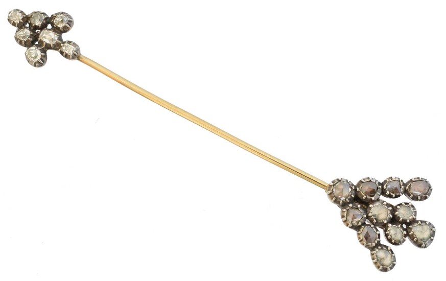 A diamond jabot pin