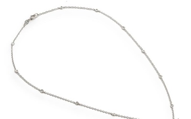 A diamond necklace set with numerous brilliant-cut diamonds weighing a total of...