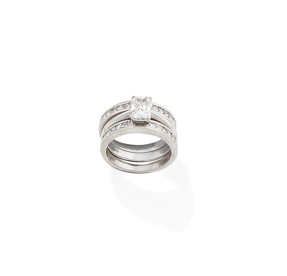 A diamond ring and two diamond half-eternity rings