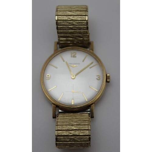A gentlemen's 'Longines' wristwatch, yellow metal case, the ...
