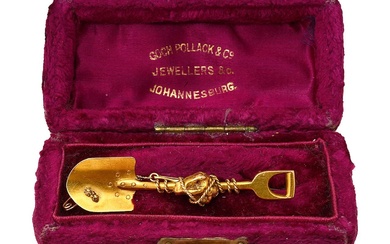 A gold South African Prospectors brooch, circa 1900