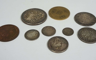 A group of assorted coins including: A USA silver one dollar, 1885; German States, Prussia, Two