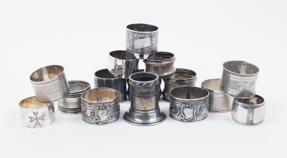 A group of seven various French silver napkin rings, together...