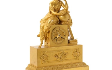 SOLD. A large late Empire gilt bronze mantel clock. France, c. 1820-30. H. 57 cm. W. 40 cm. D. 15 cm. – Bruun Rasmussen Auctioneers of Fine Art