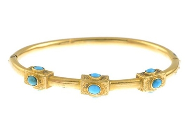 A late Victorian gold turquoise hinged bangle. Inner...