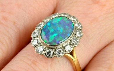 A mid 20th century 18ct gold black opal and